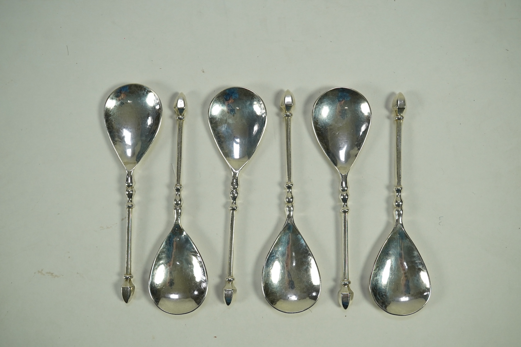 A set of six Elizabeth II Arts & Crafts silver Guild of Handicraft spoons